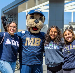 Students and Monte Rey at Admitted Otter Day