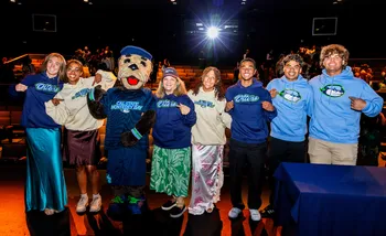 Monte Rey, Vanya and students celebrate the new athletics brand