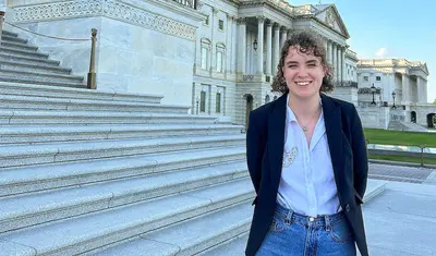 Mabel Cummings stands in front of the U.S. Capitol