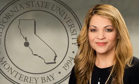 Portrait of Vanya Quinones with the CSUMB seal