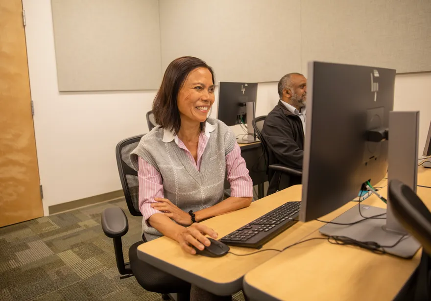 Member of finance team working at desk